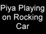 01_piya_playing_on_rocking_car.JPG