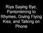 03_riya_saying_bye_pantomiming_to_rhymes_giving_flying_kiss_and_talking_on_phone.JPG